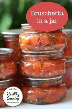 there are many jars filled with food and the words bruschetta in a jar