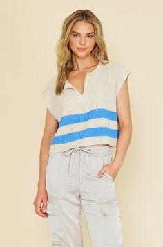 Striped sleeveless sweater with: - a loose fit - slouchy - cropped - v-neckline - and solid front and back patch. Model is wearing a small (32” bust, 26” waist, 35” hips, 5’2”) Bust Waist Length Small 50 inches 44 inches 19 inches Medium 52 inches 46 inches 20 inches Large 54 inches 48 inches 21 inches We measure each item from side seam to side seam, on a flat surface. Please consider the fabric content of each item, as fabric containing stretch may have give. Knit V-neck Crop Top For Day Out, Casual V-neck Sweater Vest For Day Out, Casual V-neck Knit Crop Top, Casual Knit V-neck Crop Top, Retro Stripes, Back Patch, Sleeveless Sweater, Mom Outfits, Knit Vest