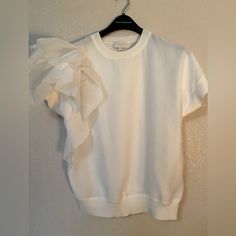 Ted Baker, Size 2, Xs, White Polyester Tee, Never Worn White Ruffled Crew Neck T-shirt, Fitted Crew Neck T-shirt With Ruffles, Fitted Ruffle Crew Neck T-shirt, Fitted Ruffled Crew Neck T-shirt, Chic Fitted T-shirt With Ruffles, Short Sleeve Tops With Ruffles For Layering, Short Sleeve Ruffled Tops For Layering, Chic Ruffled T-shirt For Spring, Crew Neck Blouse With Ruffles For Brunch