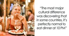 two women sitting at a table with plates of food and drinks in front of them