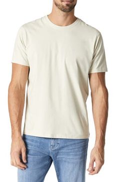 Sure to be a wardrobe favorite, this smooth and stretchy T-shirt features a classic fit and a naturally-dyed neutral hue that will look good all year 'round. 21" length Crewneck Short sleeves 48% organic cotton, 48% modal, 4% elastane Machine wash, dry flat Made in Turkey Beige Relaxed Fit Plain T-shirt, Basic Cream T-shirt For Everyday, Cream Short Sleeve Soft-washed T-shirt, Cream Soft-washed Short Sleeve T-shirt, Organic Cotton Crew Neck Top In Cream, Beige Relaxed Fit Basic T-shirt, Basic Beige Relaxed Fit T-shirt, Basic Beige T-shirt With Relaxed Fit, Classic Beige Tops For Casual Gatherings