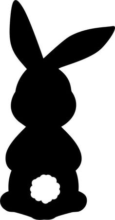 a black and white silhouette of an easter bunny