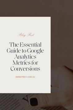 someone is reading a book with the title, the essential guide to google analytics metrics for