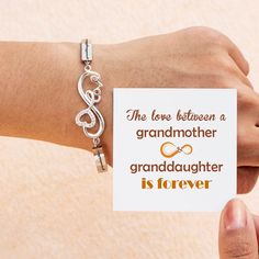 PROMOTION FOR ALL ITEMS 10% off on two or more items purchased Free shipping over $50 Design Interpretation This bracelet has the engraved words “The love between grandmother granddaughter is forever” and, on its center, it has two rings intertwined together. The design of this bracelet demonstrates the inseparable bond between grandmother and granddaughter. Gift this bracelet to your granddaughter and remind her you are forever linked together. Card Content The love between a Grandmother and Granddaughter is forever Products Details This package includes a bracelet, greeting card, gift box, and a gift bag to hold everything in it. Material: 1. Titanium steel2. Zircon Processing Techniques: Plating Age Demographic: All ages Mother's Day Friendship Heart Bracelet, Heart Bracelet For Friendship And Mother's Day, Mother's Day Inspirational Adjustable Name Bracelet, Meaningful Personalized Name Bracelet For Anniversary, Personalized Name Bracelet For Anniversary, Engraved Heart Bracelet For Anniversary, Heart Bracelet With Extender As Gift, Engraved Name Bracelet For Anniversary And Mother's Day, Engraved Name Bracelet For Anniversary, Mother's Day Gift