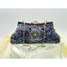 Beautiful beaded and sequined evening bag with a jeweled motif center on both sides. Silver clasps that work like a charm. Silver grey lining free of stains. Measures 9" wide, 4 1/2" tall without chain/10" with chain, 2" deep. Clutch Handbag, Floral Motif, Evening Bags, Purses And Handbags, Bags Handbags, Shoe Accessories, Bag Lady, Women Accessories, Etsy Uk