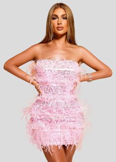 A special occasion calls for a special look. This Strapless Feathers & Sequins Mini Party Dress is the perfect choice for a fashionable night out. Crafted in pink and featuring an intricate blend of feathers and sequins, this dress sparkles with style. Occasion: Party/Club/Evening/Cocktail/Wedding Material: Polyester, Spandex Fit Type: Slim Fit Elasticity: Slight Stretch Dresses Length: Above Knee, Mini Decoration: Feathers Closure Type: zipper Strapless Pink Dress For Wedding, Flirty Mini Dress For Wedding Party Season, Pink Strapless Evening Dress For Prom Season, Pink Strapless Prom Evening Dress, Pink Sequin Mini Dress For Party, Strapless Mini Dress For Gala And Party Season, Pink Mini Dress For Wedding, Pink Strapless Gala Evening Dress, Pink Strapless Evening Dress For Gala