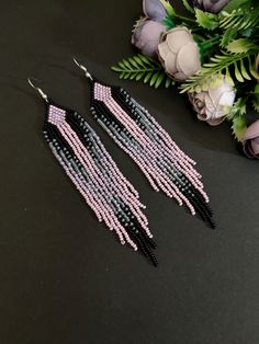 Beautiful long beaded earrings. Black pink fringe earrings. Made from Czech beads. Length 5.5 inches (13.5 cm). Width 1 inch(2.5 cm). Hypoallergenic clasp. If you want these earrings in a different color, write to me and I will be happy to make them for you. >Back to my shop: https://www.etsy.com/shop/jewelrybylarisa?ref=seller-platform-mcnav Long Beaded Fringe Earrings, Colorful Beaded Earrings, Pink Fringe Earrings, Pink And Black Earrings, Beaded Earrings Black, Pink Beaded Earrings, Octopus Crochet Pattern, Native Earrings, Diy Earrings Easy