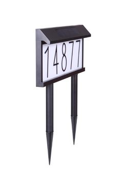 a black and white mailbox with numbers on it