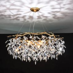 a chandelier hanging from the ceiling in a room