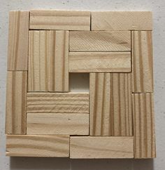 a piece of wood that has been cut into squares