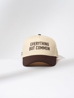 You’re far from common and people need to know that. Our Everything But Common Trucker Hat is just the accessory you need. Coming in a two-tone brown and tan colorway and a two-tone charcoal and tan colorway, this snapback hat will go with any look you’re putting together. For more embroidered trucker hats, shop our full apparel line. Brown Snapback Dad Hat For Streetwear, Brown Flat Brim Baseball Cap For Everyday, Brown Cap For Everyday, Brown Cap For Everyday Wear, Brown Dad Hat, One Size, Everyday, Brown Dad Hat For Everyday Use, Brown Dad Hat For Everyday Wear, Brown Curved Brim Snapback Hat For Streetwear, Everyday Brown Trucker Hat With Flat Bill