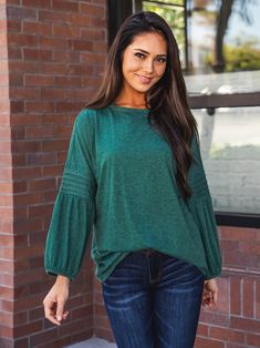 Introducing the 3/4 Pleated Sleeve Casey Top, the perfect addition to your fall wardrobe! This simple yet stylish top is a must-have for those who want to look trendy without sacrificing comfort. The detailed balloon sleeves add just the right amount of sass to your basic jeans, making you stand out from the crowd. Size Small (0-4) Medium (6-8) Large (10-12) XL (12-14) Model is 5'5" Size 2 wearing small Trendy Solid Color Long Sleeve Top For Fall, Fall Solid Color Balloon Sleeve Top, Fall Season Solid Color Tops With Balloon Sleeves, Fall Balloon Sleeve Top In Solid Color, Solid Balloon Sleeve Tops For Fall, Casual Green Tops With Gathered Sleeves, Casual Long Sleeve Balloon Top For Fall, Fall Lantern Sleeve Tops In Solid Color, Trendy 3/4 Sleeve Blouse For Fall