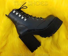 Watch Video 4 3/4"(12cm) Block Heel, 2 1/4"(5.75cm) Cleated Platform Double D-Ring Lace-Up Front Ankle Boot w/Red Stitch Detail Full Length Inside Zip Closure WOMEN'S Size's 6-11 ******Please note****** Due to High Volume Sales Pleaser/ Demonia has stopped all Direct Shipping Orders may take up to 6 weeks to arrive as we have to order them in to ship to you Shop Our collection of Pleaser In House for FAST Shipping!! contact us with any questions or concerns before ordering or if your size is not Gothic Punk, D Ring, Timberland Boots, High Heel Shoes, Block Heels, Full Length, Ankle Boot, High Heels, Shoes Heels