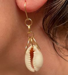 Wear a part of the beach with these beautiful natural shell earrings! which are unique and one-of-a-kind. All of my shells are different and have an epoxy coating to protect the shells for a lifetime. The metals used are Hypoallergenic and all hand-made. They are so lightweight, I forget I have them on. Perfect for summer and sun lovers! Single Drop Earring For Vacation, Single Dangle Earring For Beach, Single Earring For Beach Summer, Dangle Earrings For Beach, Gold Pierced Hoop Earrings For Beach, Beach Jewelry For Pierced Ears, Shell-shaped, Shell-shaped Ear Wire Jewelry For Beach, Shell Dangle Hoop Earrings For Beach, Shell Jewelry With Ear Wire For Beach