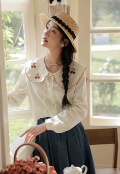 Long sleeve button up shirt with an oversized peter pan collar embroidered with cherries and scallop edges. S: 18" across shoulders, 37" chest, 23" lengthM: 18.5" across shoulders, 38.5" chest, 23" lengthL: 19" across shoulders, 40" chest, 23" lengthXL: 19.5" across shoulders, 41.5" chest, 23" length Casual Spring Blouse With Collar, Cute Spring Blouse With Peter Pan Collar, Casual Peter Pan Collar Blouse For Spring, Casual Doll Collar Blouse For Spring, Spring Blouse With Peter Pan Collar And Buttons, Casual Blouse With Floral Embroidery And Peter Pan Collar, Cottagecore Tops With Peter Pan Collar For Summer, Cottagecore Summer Tops With Peter Pan Collar, Casual Cotton Blouse With Peter Pan Collar