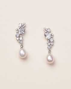 Feminine & modern, our Tate Pearl & CZ Earrings are crafted with no shortage of sparkle. Shimmering CZ stones are designed to perfectly sit along your ear with a delicate freshwater pearl drop. DIMENSIONS & DETAILS Measures 1.5 inches long. Designed with cubic zirconias & freshwater pearls. The beauty & dimension of freshwater pearls come from the slight variations in shape & hue. Finish: silver. Lightweight design. Hypoallergenic, lead-free & nickel-free. Bridal Drop Earrings, Pearl Wedding Earrings, Drop Earrings Wedding, Pearl Bridal Earrings, Mother Bride, Bridal Earrings Drop, Pearl Earrings Wedding, Wedding Earrings Drop, Bride Jewelry