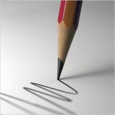 a pencil with its tip pointed up to the ground