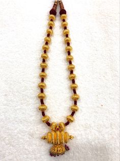 wax filled gold beads and gold beaded jewellery waxmala antique gold jewellery  thushi dholaki beads javmani beads , nagas beads javmala beads temple jewellery colour beads layered mala antique handmade beads kolhapuri beads mohanmala vajratik gokak beads groom beads necklace Chandraharam Lockets, Gold Beads Jewellery, Gold Mala, Pearl Bridal Jewelry Sets, Hyderabadi Jewelry, Simple Beaded Necklaces, Life Movie, Stone Jewellery Designs