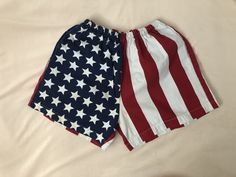 "Super cool USA flag shorts!!  Measurements (laying flat)... Waist: 12-17.5\" Hips: 25.5\" Rise: 12.5\" Inseam: 4\" Leg opening: 14\" Some yellowing around the waist - can be washed out - maybe pre-treat" Short Shorts For 4th Of July Beach Events, Shorts For 4th Of July Beach Events, Beach Shorts With Flag Print, 4th Of July Beach Shorts, Patriotic American Flag Print Shorts For Beach, Patriotic Beach Shorts With American Flag Print, American Flag Print Shorts For Memorial Day, Americana Flag Print Shorts For 4th Of July, Americana Shorts With Flag Print