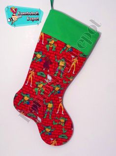 a red christmas stocking with green trim and an image of the simpsons characters on it