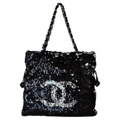 Introducing the Chanel Summer Nights Sequin Drawstring Tote Small SHW, a timeless and fashionable bag for any occasion. This exquisite bag features mesmerising sequins, chain-leather handles, and the iconic CC logo. The drawstring closure reveals a satin interior, spacious for your essentials. Condition: Appearance: B - Good: Regularly used with visible wear and tear, clear scratches, stains, and messy or loose sequins. Please see photos. Inside: AB - Very Good: Clearly used but well-maintained, with light scratches, minor stains, and slight changes in shape. Refer to photos. Part of the 2008-2009 collection, with the unique code 12XXXXXX Chanel Summer, Vintage Chanel Bag, Classic Logo, Cc Logo, Chanel Black, Vintage Chanel, Leather Chain, Chanel Handbags, Flap Bag