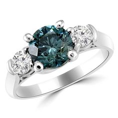 a blue diamond ring with three diamonds on the side and two white gold bands around it