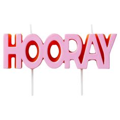 the word hooray is spelled in pink and red letters on top of toothpicks