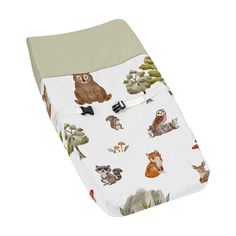 a crib sheet with animals and trees on it