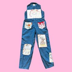 Let's Kitch-ify some jumpsuits ! 100% Upcycled and eco friendly jumpsuit given new life with the addition of vintage embroidery, hankies, and textiles ✨ To give it that crazy quilt feel, I've hand embroidered stitches to the pieces, a absolute labor of love ❤️ Measurements: Bust: 38 in. Waist: 34 in. Hip: 42 in. Torso: 17 in. Inseam: 28 in. Length: 38 in. Total rise: 27.5 in. All items are made of true vintage materials and maay show signs of the age. Please look at pictures closely. Vintage Denim Overalls With Patchwork, Vintage Cotton Jumpsuit With Relaxed Fit, Vintage Cotton Jumpsuits And Rompers With Relaxed Fit, Vintage Cotton Relaxed Fit Jumpsuits And Rompers, Vintage Cotton Jumpsuits And Rompers In Relaxed Fit, Vintage Cotton Patchwork Overalls, Retro Bib Front Denim Jumpsuit, Retro Cotton Denim Jumpsuit With Bib Front, Blue Patchwork Denim Overalls Jumpsuit