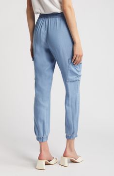 These season-staple joggers are designed in light-wash chambray with cool cargo pockets. Elastic/drawstring waist Front slant pockets; cargo flap-patch pockets Elastic cuffs Unlined 99% cotton, 1% spandex Machine wash, line dry Made in the USA Hairstyling Products, Rollerball Perfume, Cargo Joggers, Blue Fits, Beauty Sale, Fragrance Design, Lund, Nordstrom Store, Styling Tools