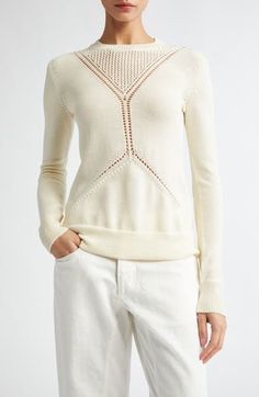 The German design house known for its minimalist essentials masterfully knits rich wool-and-cotton yarn to create an intricately pointelle-detailed sweater. Crewneck Long sleeves Ribbed cuffs and hem 67% wool, 33% cotton Dry clean Made in Italy Designer Clothing Chic Cashmere Sweater With Pointelle Knit, Spring Cashmere Sweater With Pointelle Knit, Chic Turtleneck Sweater With Pointelle Knit, Chic Turtleneck Pointelle Knit Sweater, Chic Pointelle Knit Turtleneck Sweater, Crew Neck Cashmere Sweater With Pointelle Knit, Cashmere Pointelle Knit Crew Neck Sweater, Elegant Cashmere Knit Sweater, Elegant Wool Sweater With Pointelle Knit