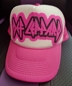 Def Leppard pink mesh trucker hat. Pink & black puff vinyl. Mesh Hats For Spring Streetwear, Casual Pink Mesh Baseball Cap, Mesh Visor Trucker Hat For Streetwear, Pink Mesh Hat With Curved Brim, Pink Trucker Snapback Hat With Flat Brim, Casual Pink Mesh Trucker Hat, Mesh Hats For Streetwear, Pink Mesh Baseball Cap, Pink Mesh Baseball Cap For Summer