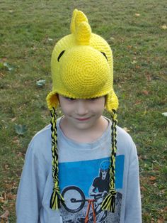 This hat is inspired by Woodstock. I make a Snoopy inspired hat and had quite a few customers request Woodstock inspired hat as well. The hat Playful Adjustable Brimmed Costume Hats, Playful Adjustable Brimmed Costume Hats And Headpieces, Fun Beanie Hat One Size, Fun Beanie Hat One Size Fits Most, Playful Yellow Beanie Hat, Yellow Novelty Cap Style Hat, Yellow Novelty Cap, Fun Crochet Cap, One Size Fits Most, Playful Adjustable Costume Hats And Headpieces