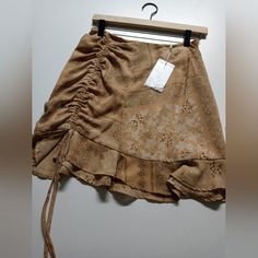 Pair This Ruched Skirt With Cowgirl Boots Or Wedges To Elevate The Outfit. Skirt Does Not Stretch But You Can Adjust The Side To Shorten/Length The End. Brown Skirt For Spring, Brown Spring Skirt, Brown Mini Skirt For Summer, Brown High Waist Mini Skirt For Summer, Brown Skirted Bottoms For Summer, High Waist Brown Skort For Summer, Summer Pleated Brown Mini Skirt, Brown Bohemian Mini Skirt For Summer, Summer Brown Tiered Skirt Bottoms