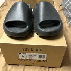 Yeezy Slides Brand New Size 4 Adidas Casual Slides For Streetwear, Adidas Slides With Rubber Sole For Streetwear, Yezzy Shoes Women Slides, Slate Grey Yeezy Slides, Orange Yeezy Slides, Yeezy Slides Pure, Black Slip-on Slides For Streetwear, Adidas Shoes Yeezy, Yeezy Slides