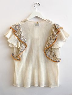 Antik Batik Colas Tee - Cream Chic Beige Embellished Tops, Chic Embellished Beige Tops, Cream V-neck Top With Crochet Trim, Cream V-neck Blouse With Floral Embroidery, Chic V-neck Blouse With Crochet Trim, Bohemian Ruffled Lace Top For Summer, Elegant Embroidered Top With Sleeves For Summer, Elegant Summer Embroidered Top With Sleeves, Elegant Summer Top With Embroidered Sleeves