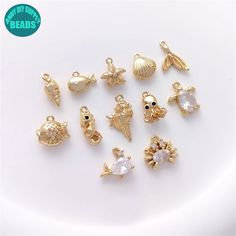 14k Gold Plated Ocean Charm Set,ocean charms,jewelry charms,sea charms,Animal Charm,bracelet charm,Earring Pendant ❥Material: Base metal: Brass Real 14K Gold plated Brass,with Color protecting Layer. ➤Lead free;Nickel Free ❥Size: Please refer to the Pic ❥ Shipping ➤We ship from China. ➤Usually It will take 2-3 Weeks to US ➤Usually It will take 2-4 Weeks to other countries Ocean-inspired Dangle Charms Jewelry, Gold Ocean-inspired Jewelry With Dangling Charms, Ocean-inspired Gold Jewelry With Dangling Charms, Ocean-inspired Charms For Jewelry Making, Ocean-inspired Jewelry With Dangling Charms For Gifts, Ocean-inspired Charm Necklaces For Gifts, Ocean-inspired Charm Necklaces As Gift, Ocean-inspired Charm Necklaces As Gifts, Ocean-inspired Charm Necklace For Gift