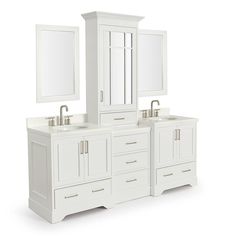 a bathroom vanity with two sinks and mirrors