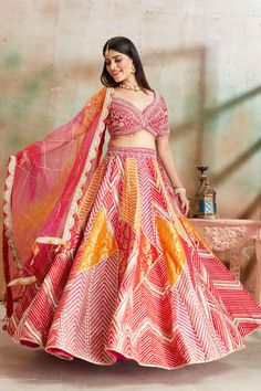 Go for a beautiful traditional look at weddings in this exquisite orange and pink embroidered Banarasi silk lehenga. The lehenga comes with a beautiful dupatta. Pink Chanderi Lehenga With Intricate Embroidery, Multicolor Embroidered Banarasi Silk Lehenga For Wedding, Multicolor Banarasi Silk Choli With Resham Embroidery, Navratri Banarasi Silk Lehenga With Multicolor Embroidery, Orange Embroidered Dola Silk Lehenga, Pink Banarasi Silk Choli With Intricate Embroidery, Multicolor Embroidered Banarasi Silk Choli, Designer Orange Lehenga With Intricate Embroidery, Designer Orange Choli With Intricate Embroidery