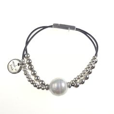 Two Strand Leather and Bead Bracelet with Magnetic Clasp and Large Freshwater Pearl- Length: 7.5"- Pearl: 15mm Leather And Bead Bracelet, Magnetic Clasp, Bead Bracelet, The Two, Buy 1, Instagram Followers, Sale Items, Freshwater Pearls, Modern Style