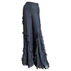 Oscar de la Renta Silk Ruffle Palazzo Pants | From a unique collection of rare vintage Wide Leg Pants at https://www.1stdibs.com/fashion/clothing/pants/wide-leg-pants/. Chic Full-length Ruffled Bottoms, Fitted Ruffled Pants For Evening, Fitted Evening Pants With Ruffles, Fitted Pants With Ruffles For Evening, Elegant Ruffled Bottoms For Party, Ruffled Wide Leg Party Bottoms, Evening Wide-leg Ruffled Pants, Ruffled Wide Leg Pants For Evening, Evening Wide Leg Ruffled Pants