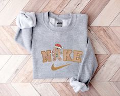 Introducing our delightful Gingerbread Christmas Embroidered Crewneck Sweatshirt! Perfect for both men and women, this cozy sweatshirt features a festive Grinch Sweatshirt, Sweatshirt Nike, Maroon Hoodie, Toy Story Shirt, Hawaiian Shirt Women, Embroidered Crewneck, Hoodie Material, Grinch Christmas, Embroidered Sweater