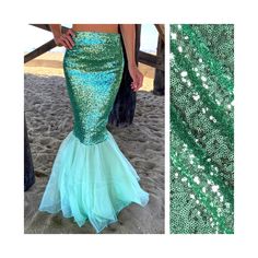 a mermaid style dress with sequins on the bottom and green skirt underneath it