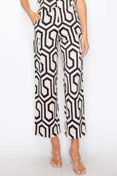 • SKU: P2126• S-M-L• Hand wash only• Feature a stylish and eye-catching geometric print that adds a touch of modernity to your outfit.• These pants come with both side pockets and flap pockets, providing ample space to keep your essentials handy.• The belt loop design allows you to accessorize with your favorite belts, enhancing the pants' overall chic look. Casual Wide Leg Pants With Abstract Print, Chic Bold Print Summer Pants, Summer Wide Leg Bottoms With Abstract Print, Chic Summer Bottoms With Bold Print, Chic Patterned Summer Bottoms, Wide Leg Bottoms With Abstract Print For Summer, Chic Patterned Bottoms For Summer, Chic Abstract Print Pants For Spring, Patterned Long Pants With Pockets