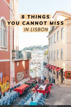 tables and chairs in an alleyway with the words 8 things you cannot miss in lisbon, portugal