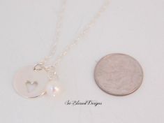 "Mother of the Groom, Mother of Bride gift, Mother in Law POEM, Heart cutout necklace, Sterling Silver charm, Wedding jewelry, mother in law This is such a great necklace for the Mother of the Groom. This is the sweetest sterling silver heart cutout necklace and the Mother in law saying goes so great with the necklace. I added a freshwater pearl to give it a timeless look. I'm also happy to change the wording on the card to make it for a Mother of the Bride. The insert card is printed on heavy c Delicate Personalized Necklaces For Wedding Gift, Delicate Heart Charm Jewelry For Wedding, Heart Necklace For Wedding And Mother's Day, Elegant Hand Stamped Necklaces For Wedding, Wedding Heart Charm Necklace For Mother's Day, Heart Charm Necklace For Wedding On Mother's Day, Engraved Round Pendant Heart Necklace For Weddings, White Heart Necklace For Wedding On Valentine's Day, Dainty Round Heart Necklace For Wedding