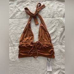 Women’s Cute & Soft Brown Halter Top From Cider, Perfect Color For Fall And Brand New Fits True To Size (Xs) Nwt, No Defects Brown Stretch Halter Neck Crop Top, Spring Ruched Stretch Halter Top, Casual Fitted Halter Top With Tie Back, Fitted Casual Halter Top With Tie Back, Fitted Sleeveless Halter Top With Drawstring, Trendy Stretch Brown Halter Top, Fitted Brown Ruched Top, Brown Fitted Halter Top For Vacation, Fitted Brown Halter Top For Vacation