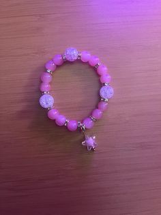 My beautiful daughter just made her first bracelet. Description is glass bed bracelet pink with a star charm size 5.5 in please not it does not come in a box Pink Bracelet Aesthetic, Bracelet Aesthetic, Chula Vista, My Beautiful Daughter, Pink Bracelet, Star Charms, Rings Statement, In A Box, Favorite Things Gift