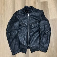 We offer FREE WORLDWIDE SHIPPING on all of our items. Please check measurements for most accurate fit. All measurements are done in inches and with item laying flat. Feel free to message with any questions.  Tag size: N/A Measurements in pictures  Flaws: N/A Vintage Leather Jacket With Zipper, Vintage Leather Jacket With Zipper Closure, Vintage Biker Jacket With Zipper For Streetwear, Fitted Vintage Biker Jacket With Zipper, Retro Biker Jacket With Zipper Closure, Vintage Biker Jacket With Zipper Closure, Vintage Black Leather Jacket With Long Sleeves, Vintage Black Long Sleeve Leather Jacket, Zip Up Jacket