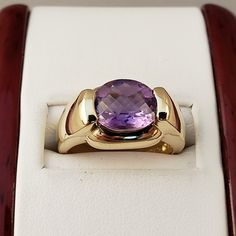 "\"Previously Loved, Not New\" Vintage Amethyst Ring, Featuring a Genuine Amethyst center (*Price of the ring is really gold only. The center is pretty scratched on the surface.*) This Genuine Purple Amethyst center stone is a checkered board cut oval shape. 14k Yellow Gold setting with 2 heavy bars. **Ring size: 6.25 **Amethyst is February's Birthstone, AND 2018 color of the year. This item can be sized up or down 2 sizes for an additional $30.00 Please feel free to contact me anytime, if you h Classic Amethyst Ring With Round Cut, Formal 14k Stamped Amethyst Ring, Heirloom 14k Gold Amethyst Ring With Accent Stones, Formal Amethyst Birthstone Ring With Round Stone, 14k Yellow Gold Amethyst Ring With Accent Stones, Classic Amethyst Purple Rings, Fine Jewelry Amethyst Birthstone Ring In Yellow Gold, Fine Jewelry 14k Gold Amethyst Ring With Accent Stones, Fine Jewelry Amethyst Ring In Yellow Gold